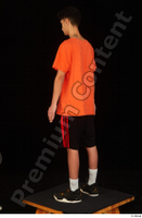  Danior black shorts black sneakers dressed orange t shirt shoes sports standing whole body 0004.jpg